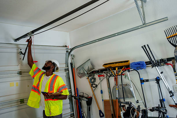 Professional Garage Door Panel Replacement technician working in North Ogden, UT